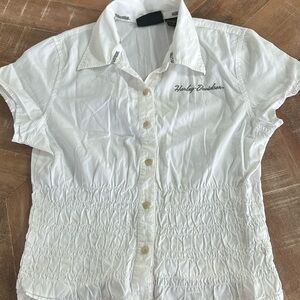 White button up shirt with the elastic fitted around the waist
